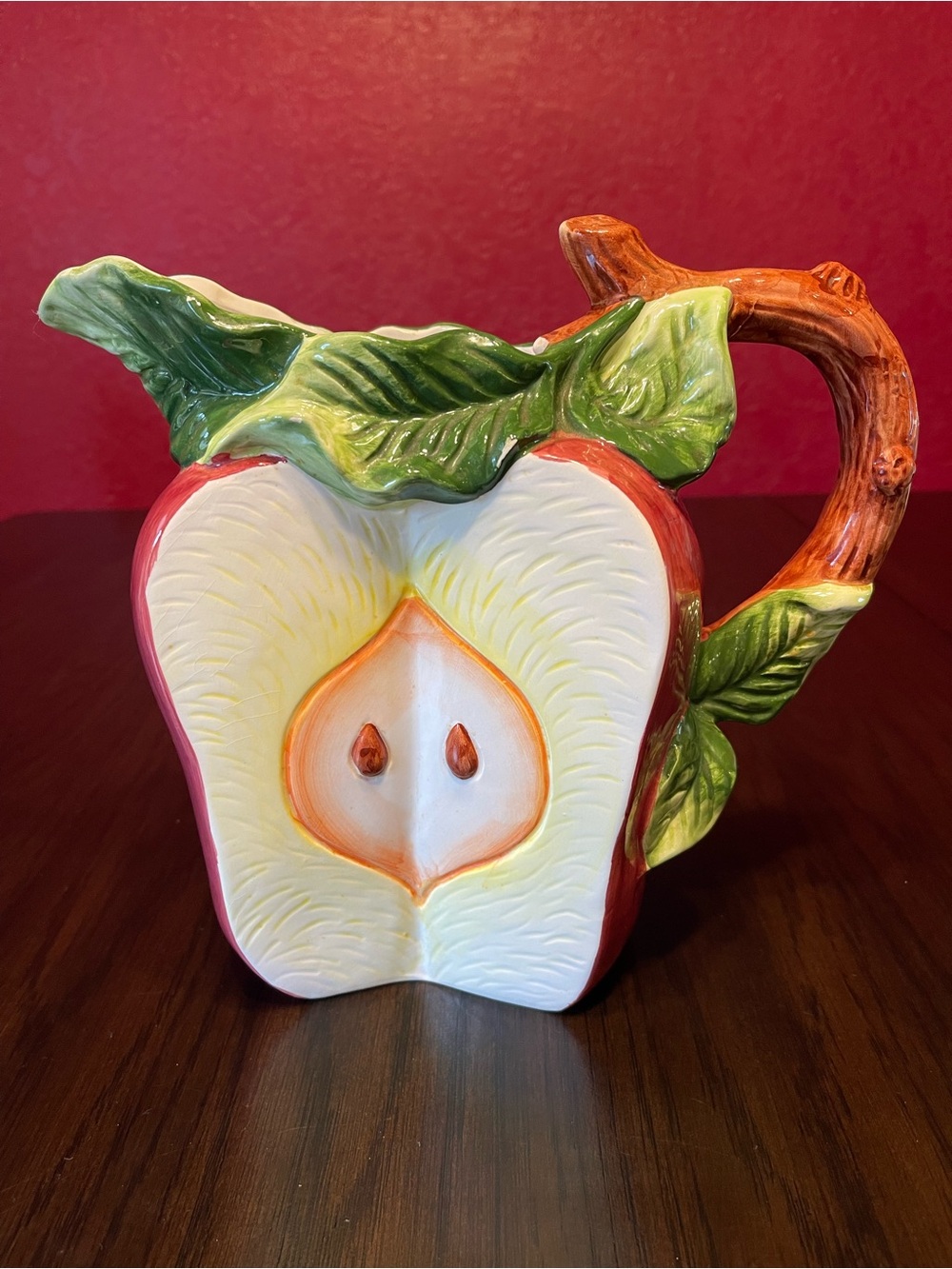 Vintage Bassano majolica ceramic pitcher shaped like a halved red apple